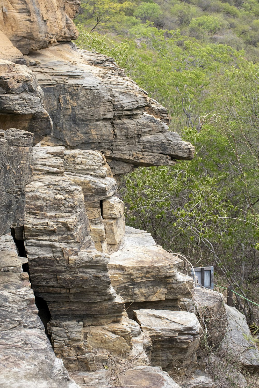 a rock formation with a small window in the middle of it