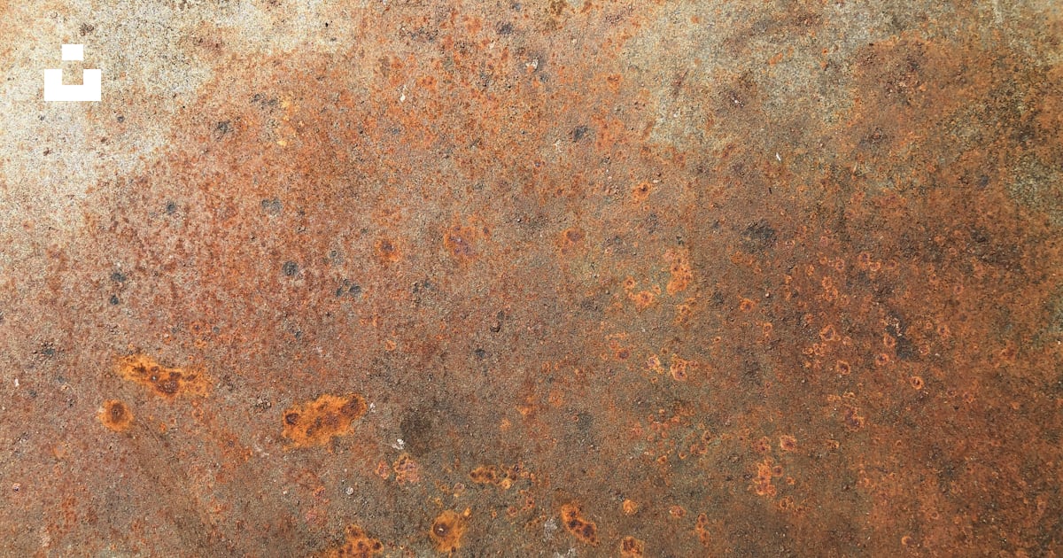 A rusted metal surface with some rust on it photo – Free Rust Image on ...