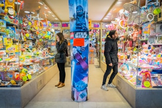 a couple of people that are standing in a store