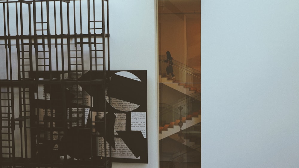 a man walking up a flight of stairs