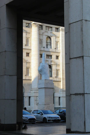 Close-up of the unfolded bill showing the big middle finger and the message 'You park like crap!'