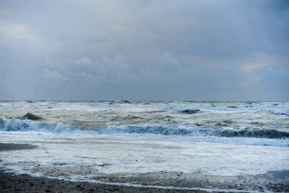 a view of the ocean from a beach