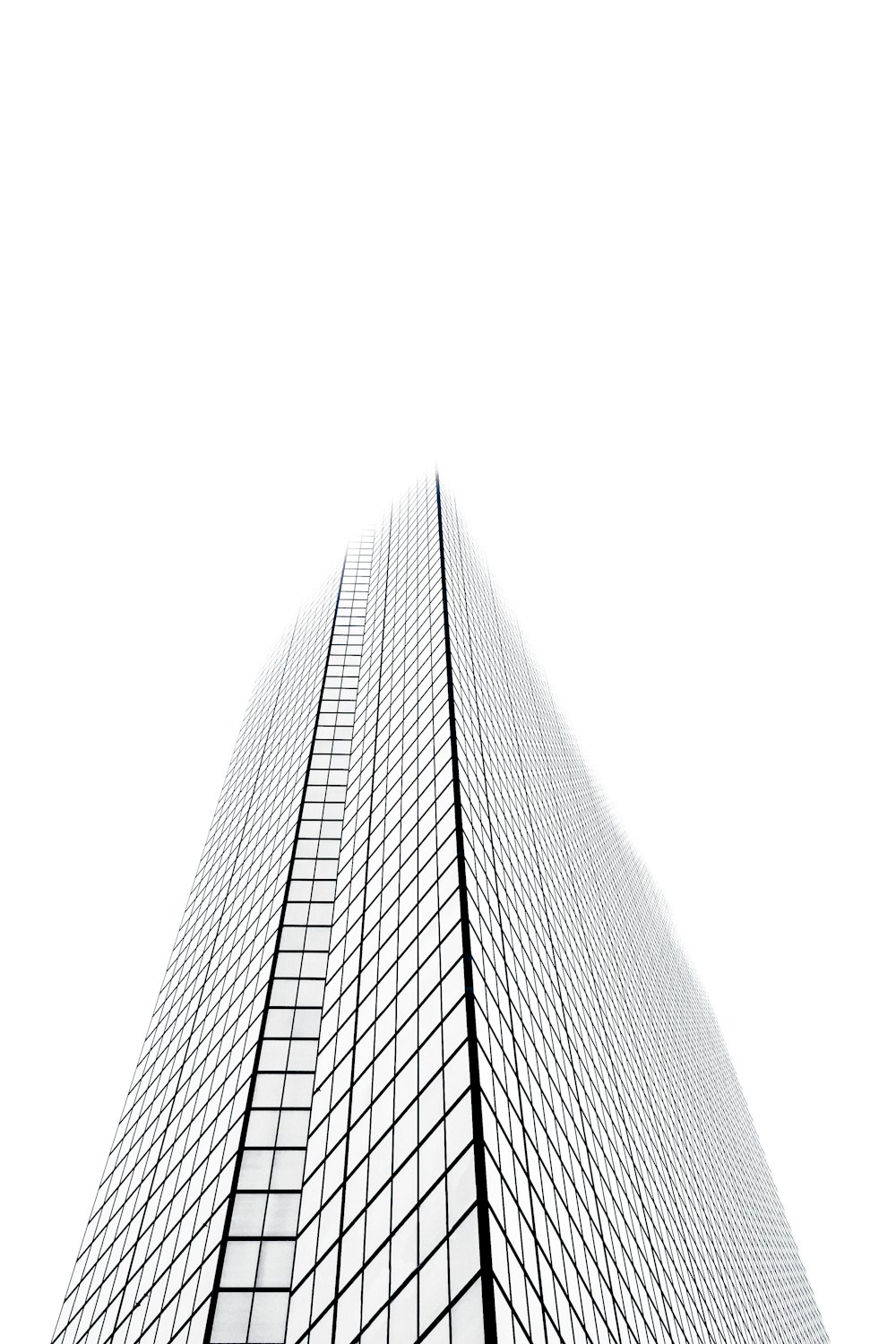 a black and white photo of a tall building