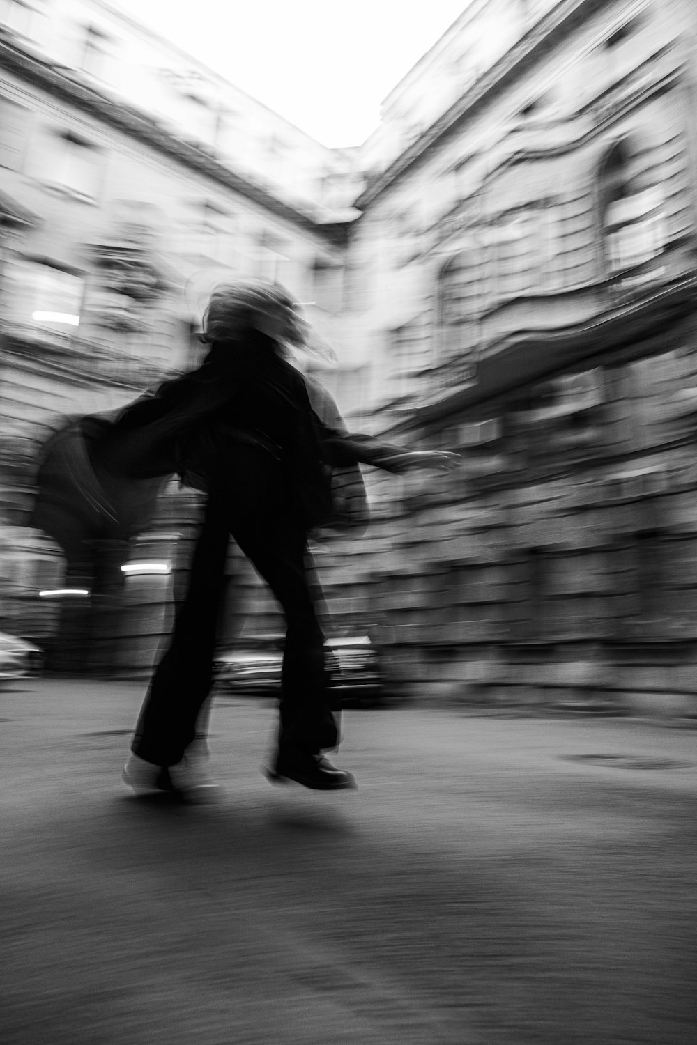 a blurry photo of a person riding a skateboard