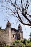 a large building with two towers on top of it