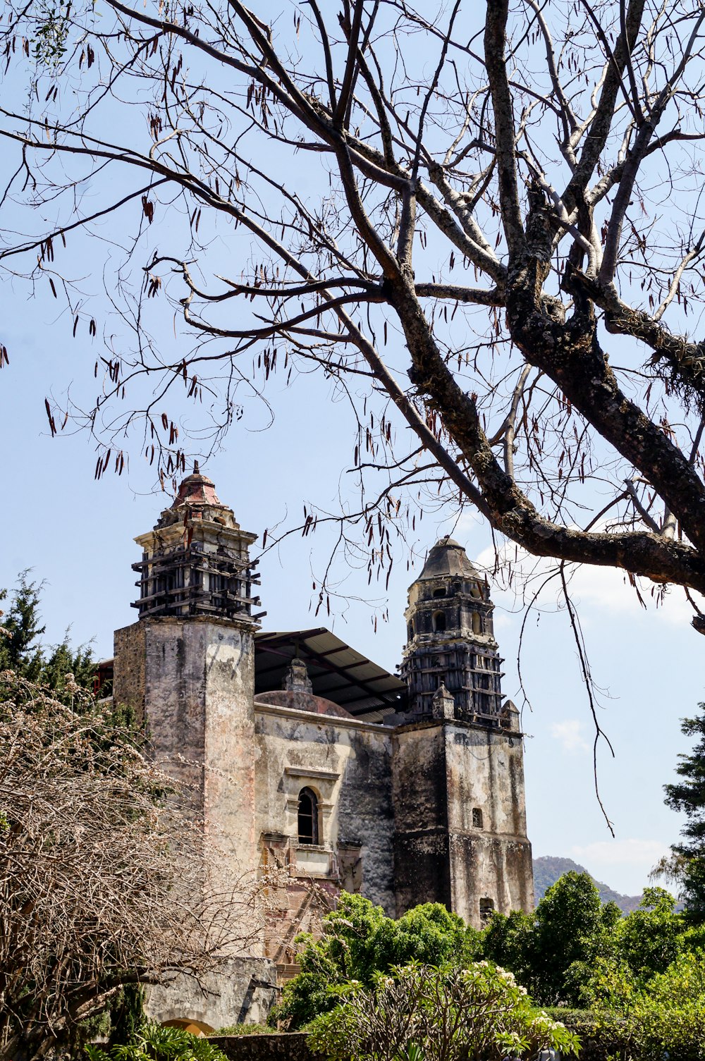 a large building with two towers on top of it