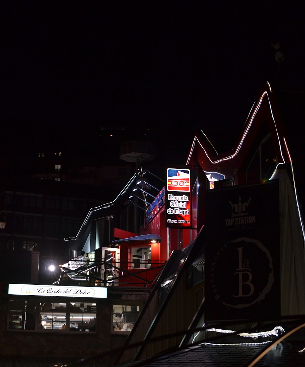 an escalator in a city at night