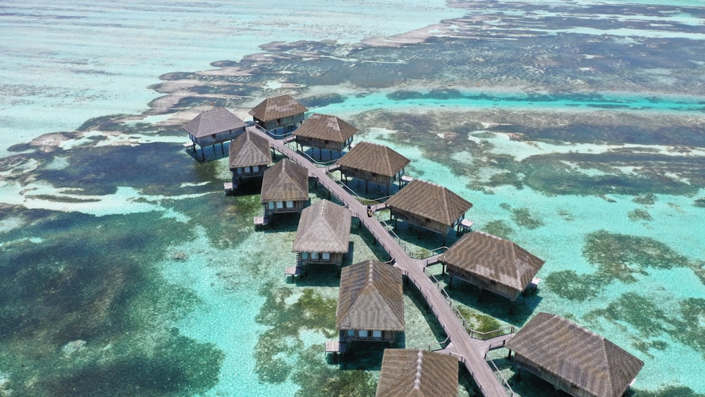 a bunch of huts that are in the water