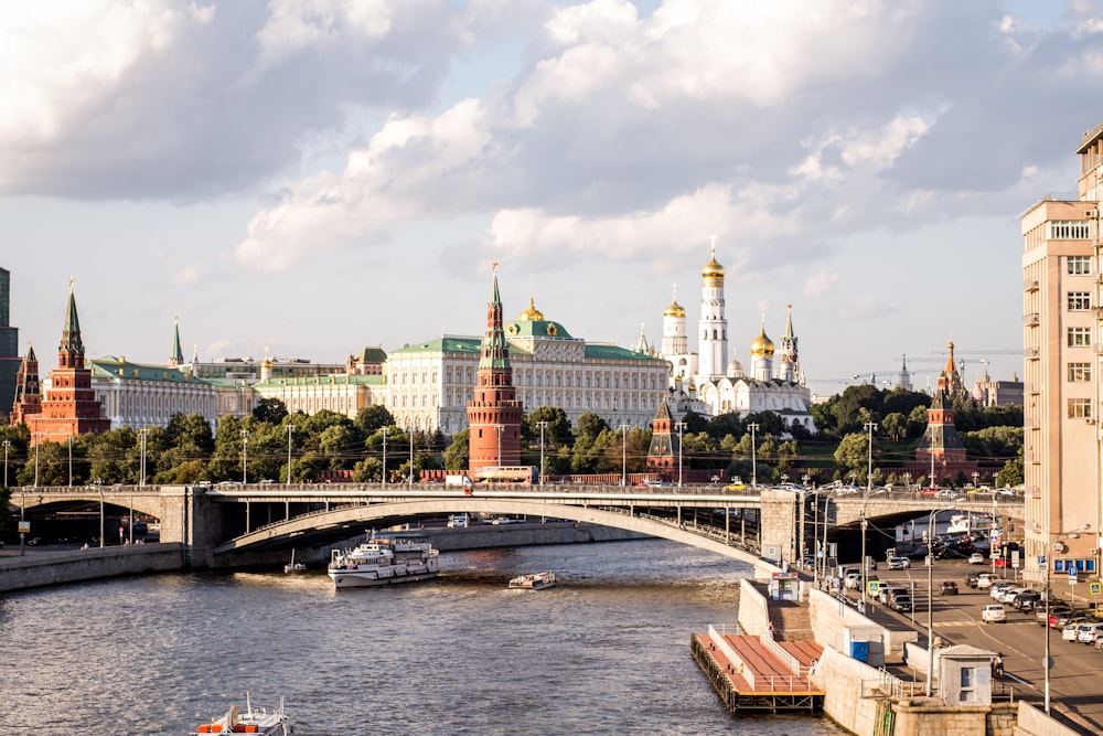 a view of a bridge over a river in a city