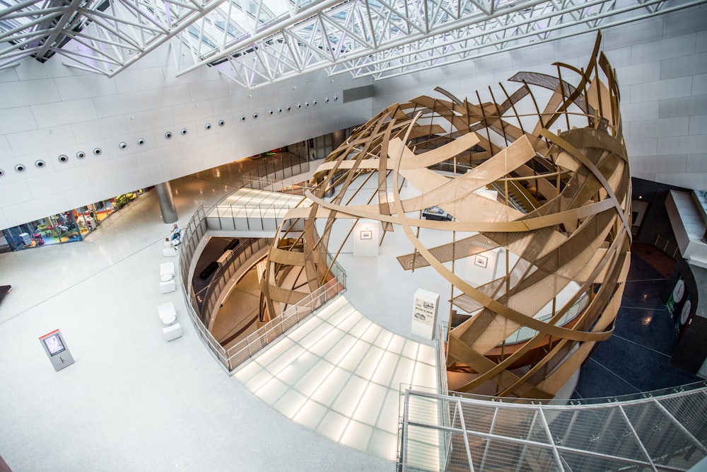 a large wooden structure inside of a building