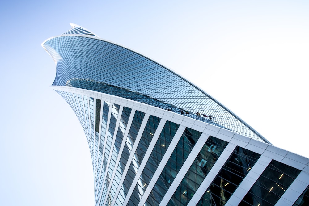 a very tall building with a sky in the background