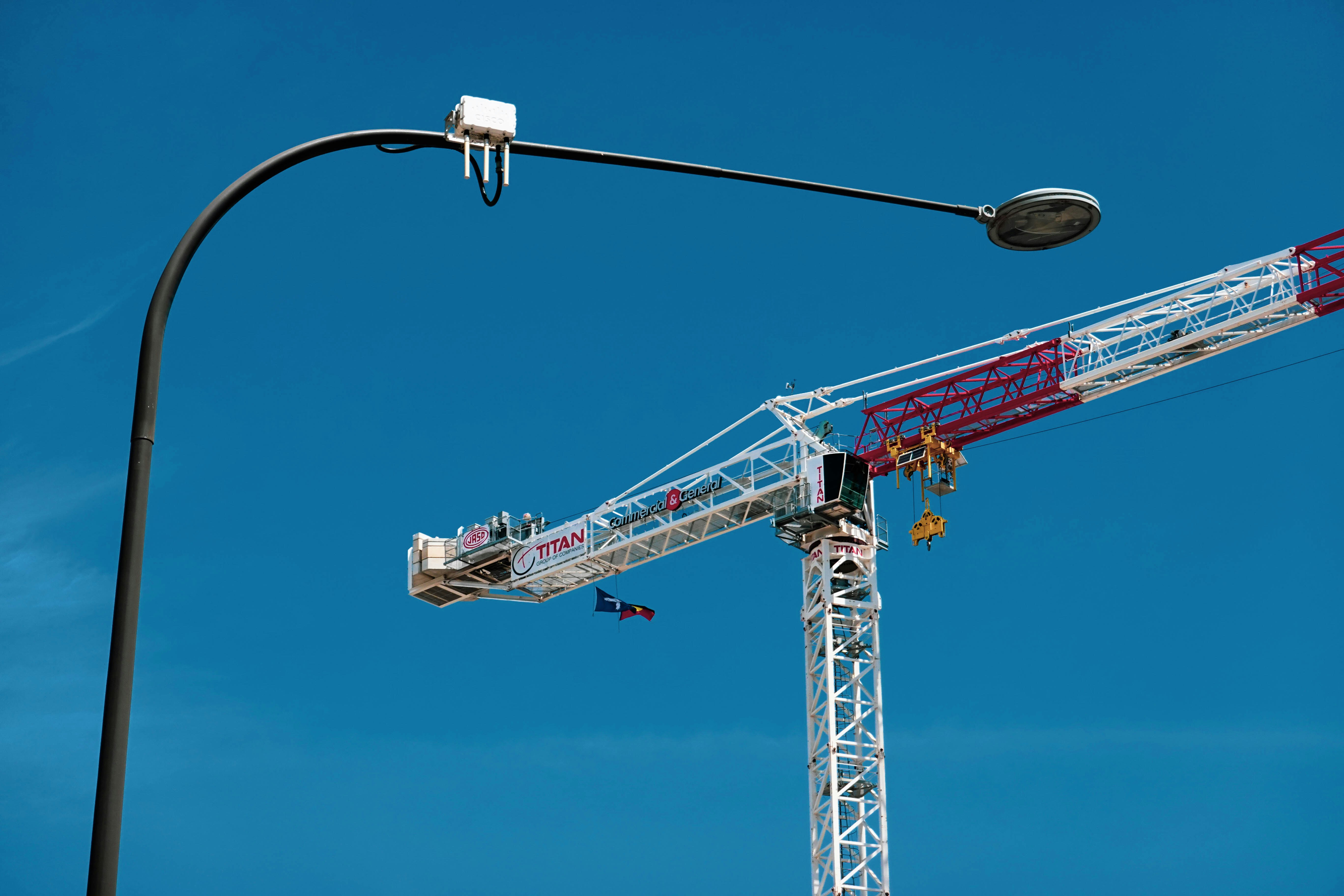 a crane is attached to a street light