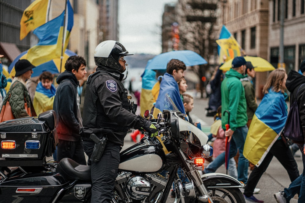 a police officer riding on the back of a motorcycle