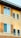 A close-up of a freshly painted building exterior.