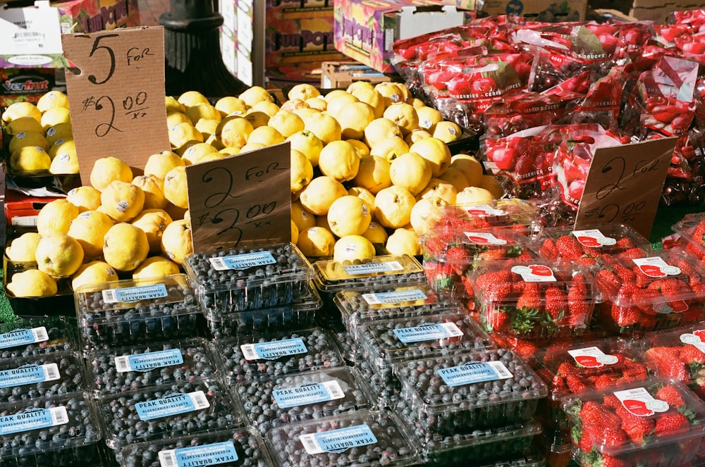 a display in a store filled with lots of fruit
