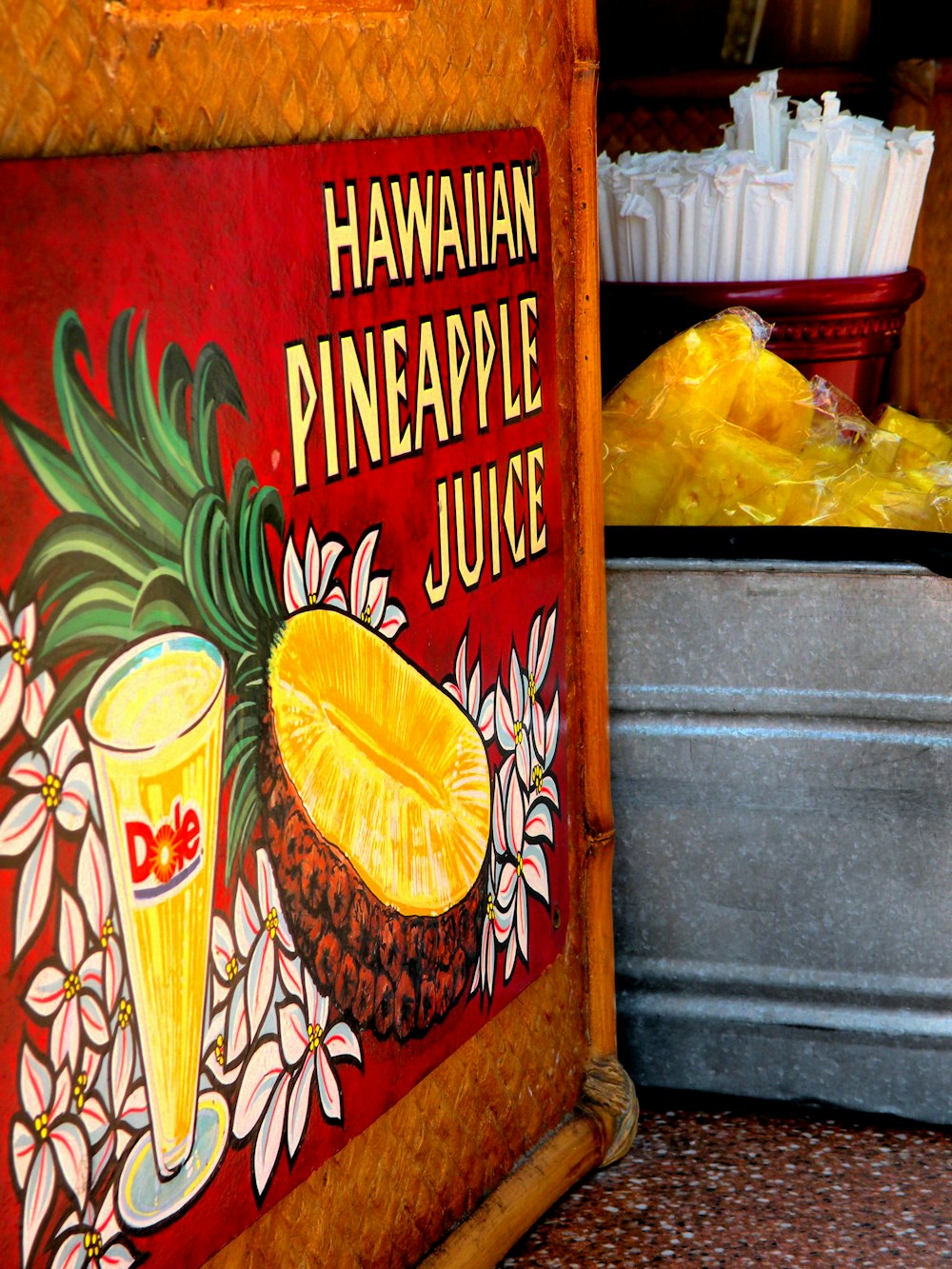 a painting of a pineapple juice sign