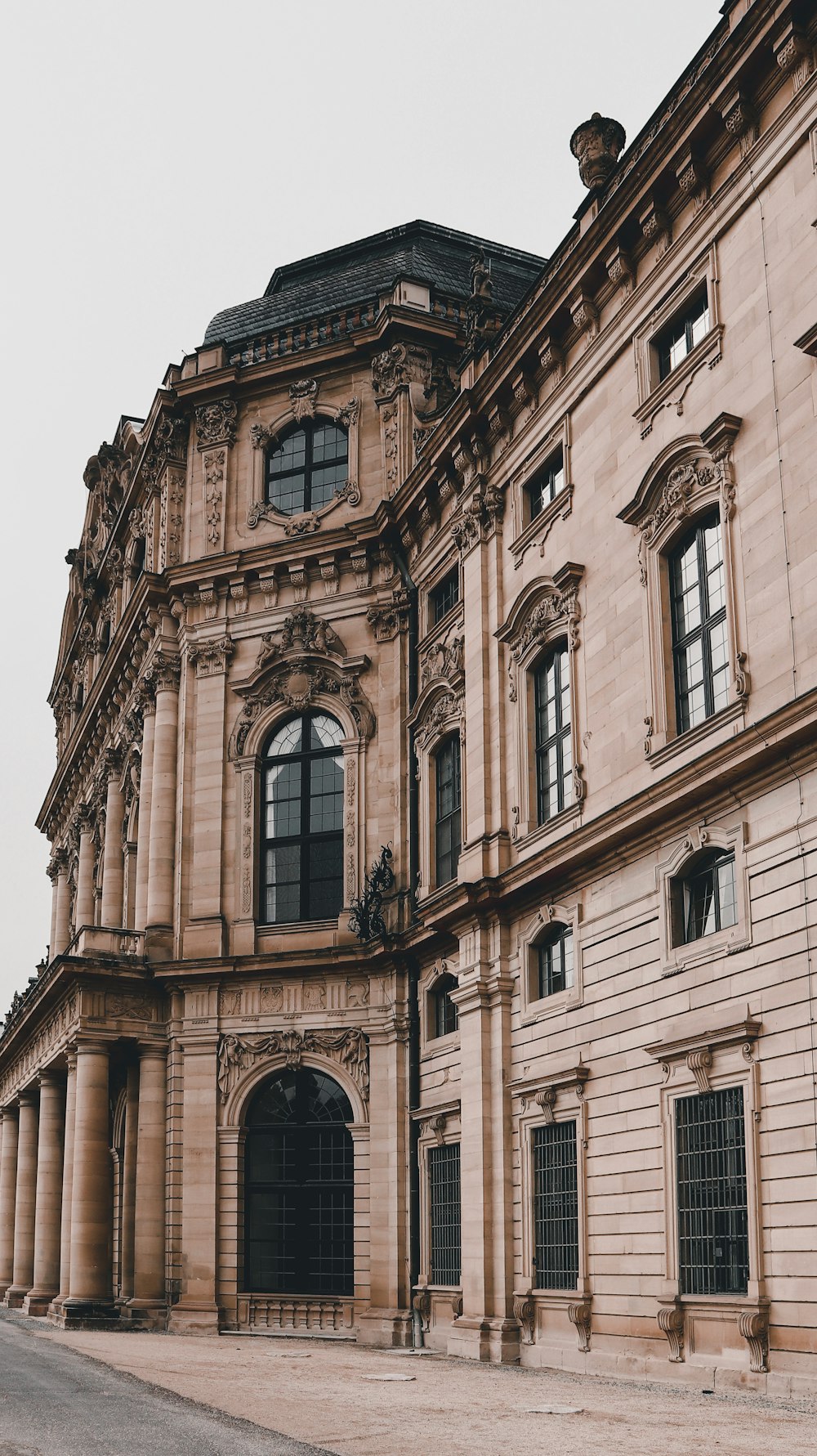 a large building with a clock on the front of it