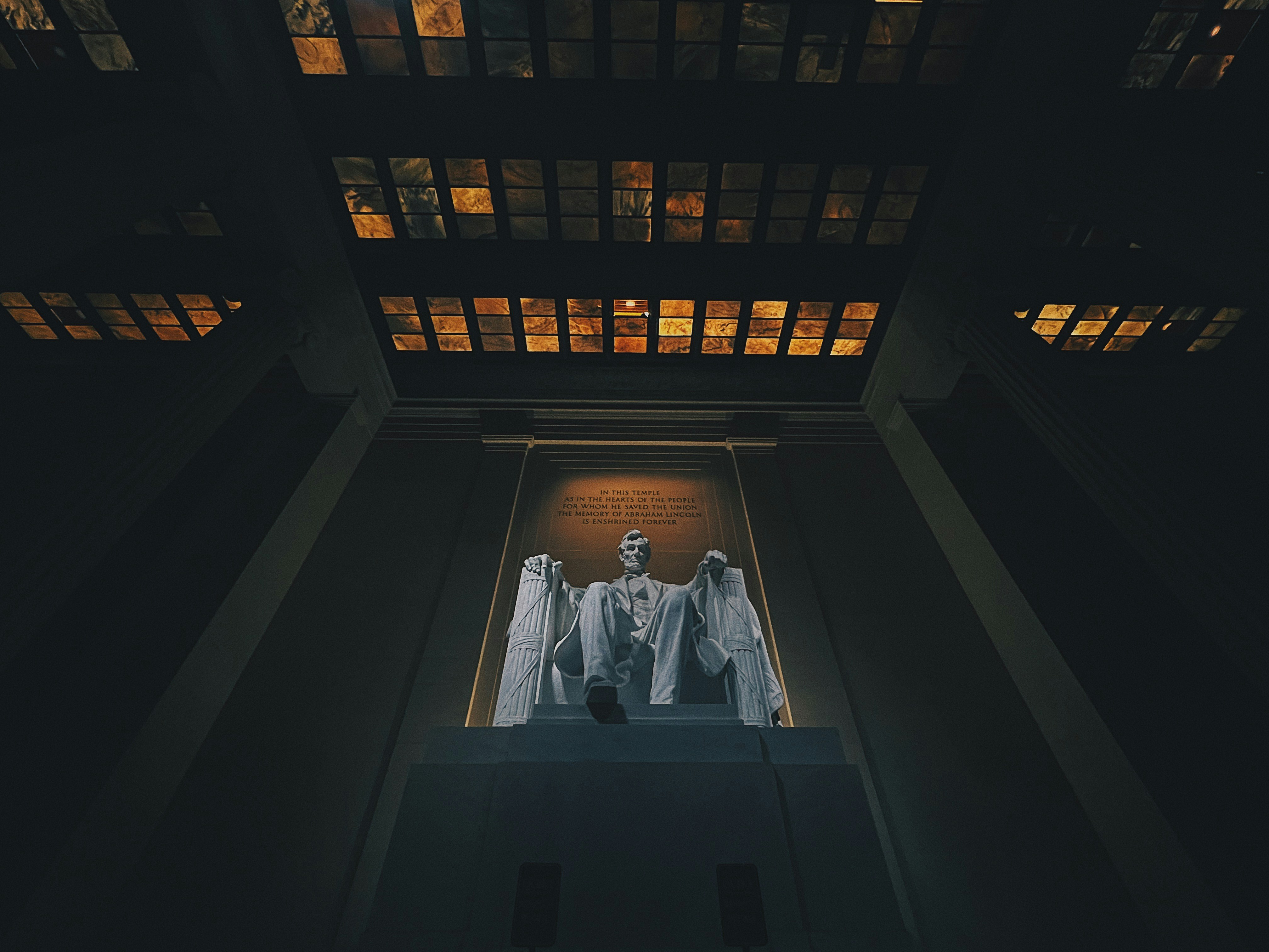 a statue of abraham lincoln in the middle of a building