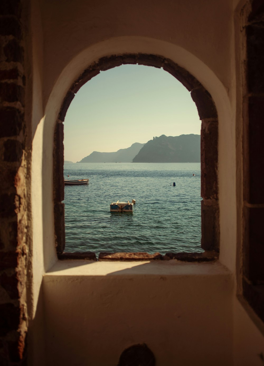 a view of a body of water through a window