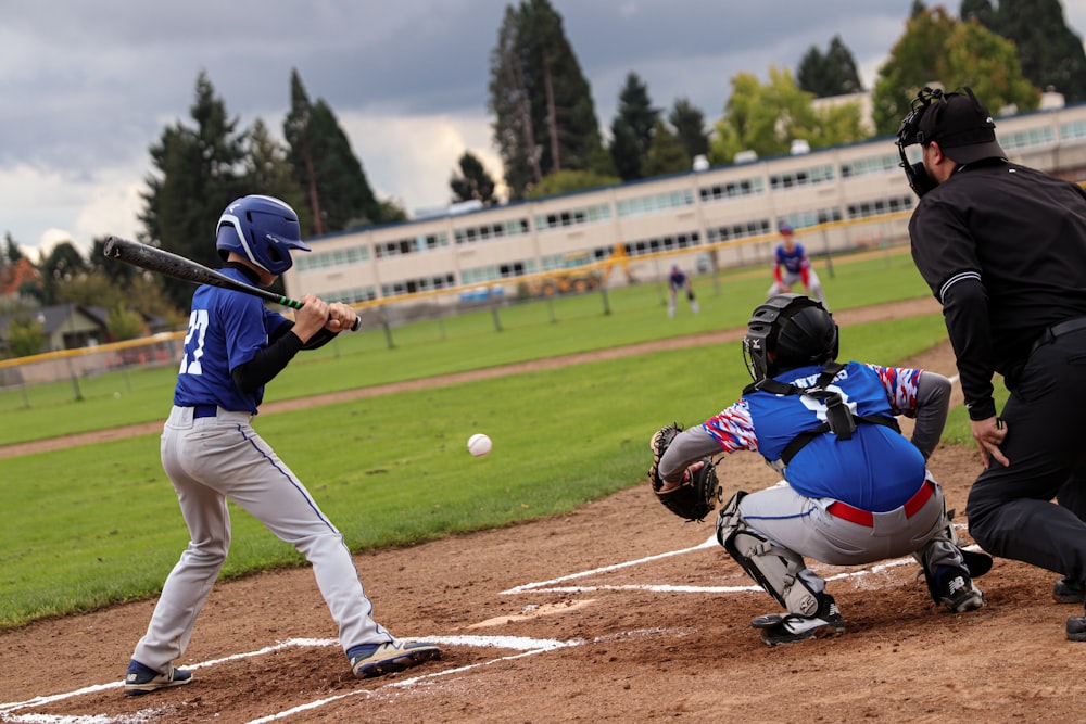 a batter, catcher and umpire during a baseball game