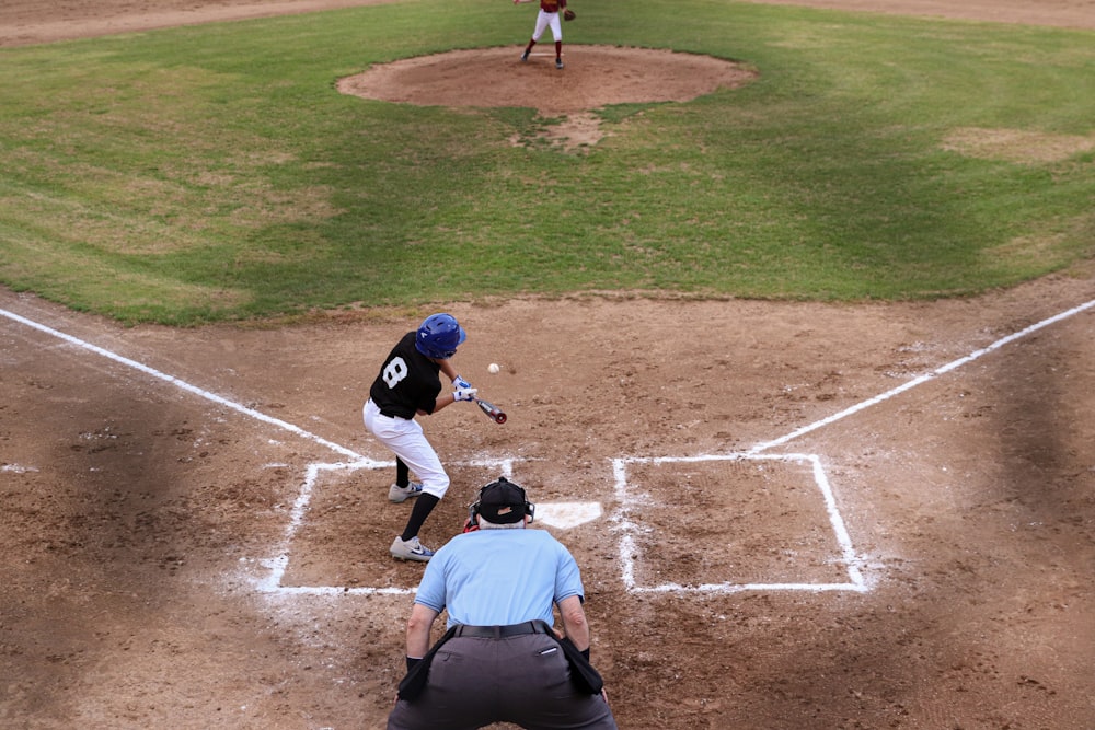 a batter, catcher and umpire during a baseball game