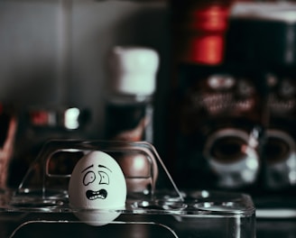 an egg with a mustache and a mustache drawn on it