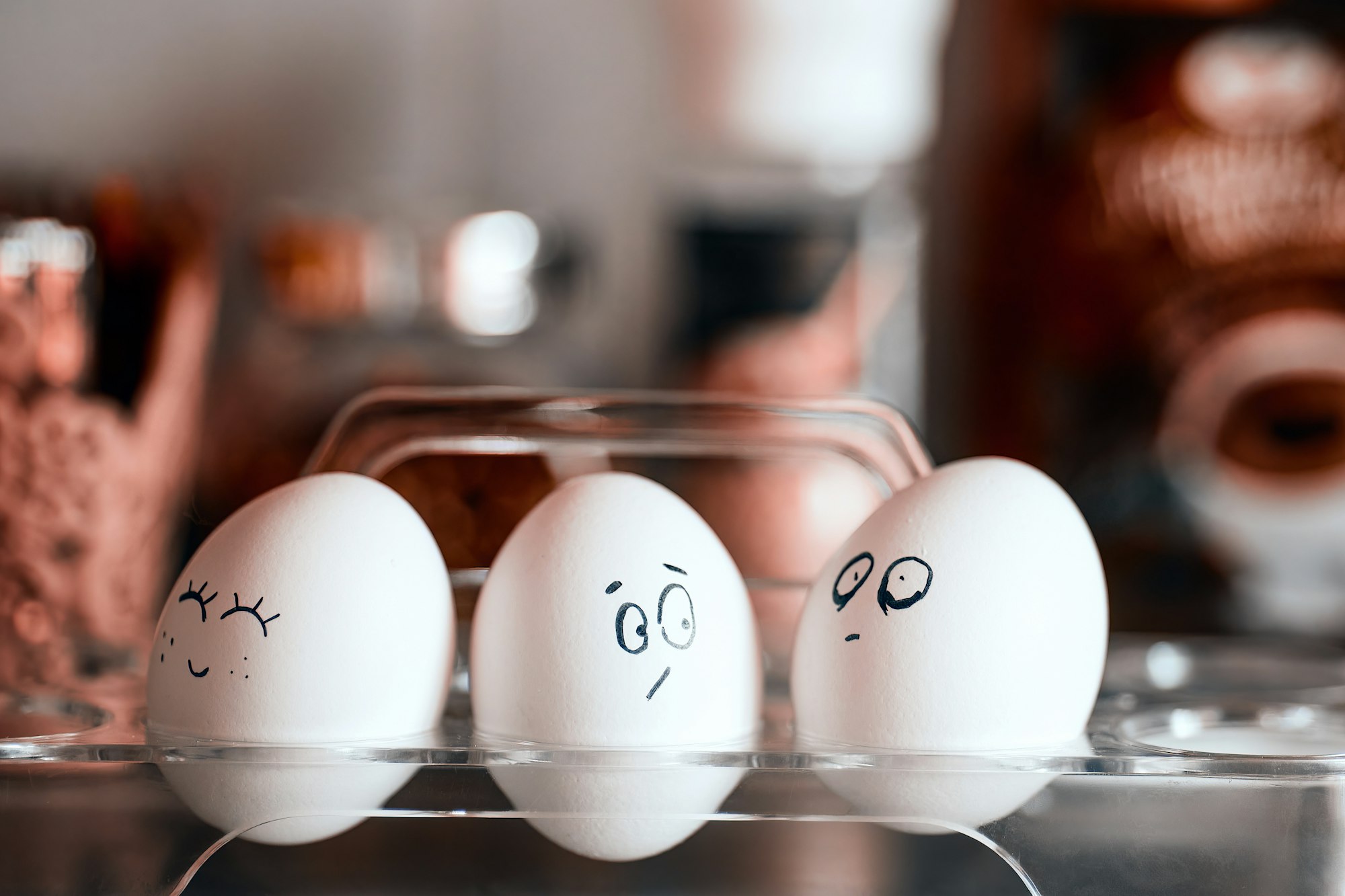 Emotional chicken eggs - cheerful, surprised, devastated and depressed. Background for a website about psychological support or articles about human psychology. Food and psychology - a splash screen for social networks