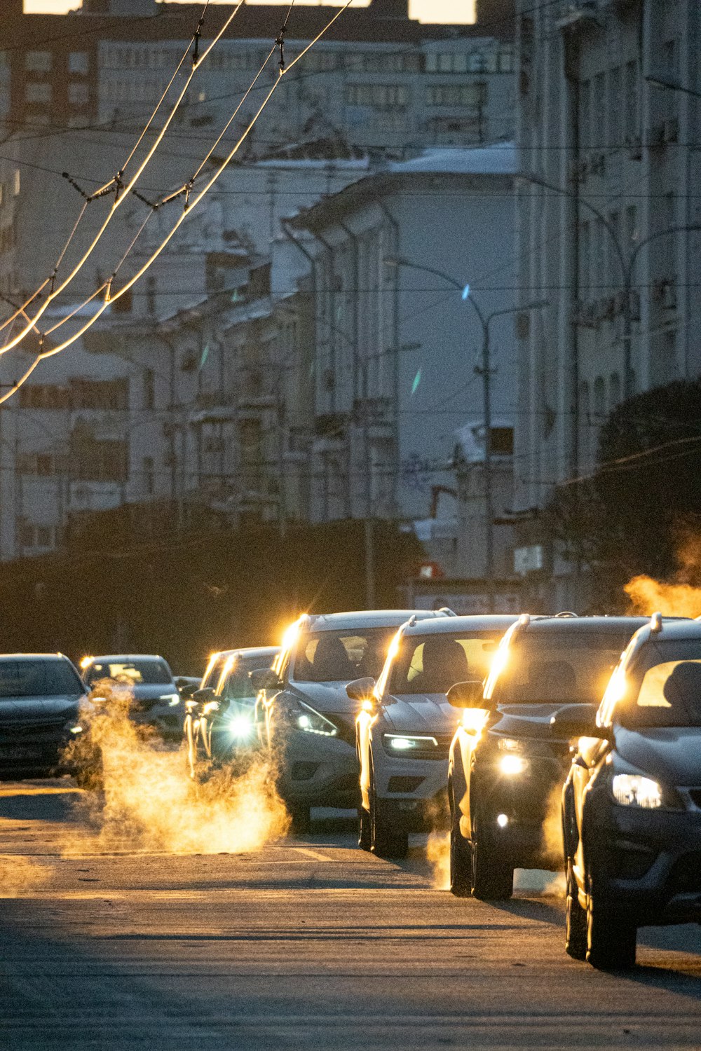 a bunch of cars that are sitting in the street