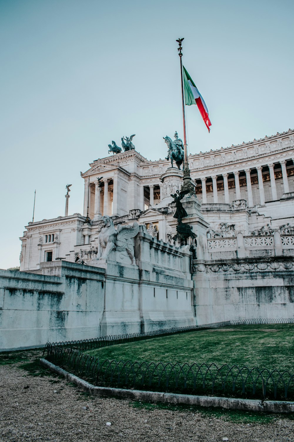 a large building with a flag on top of it