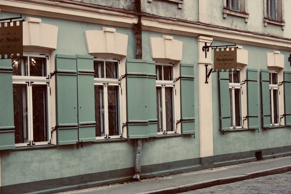 a row of windows on the side of a building