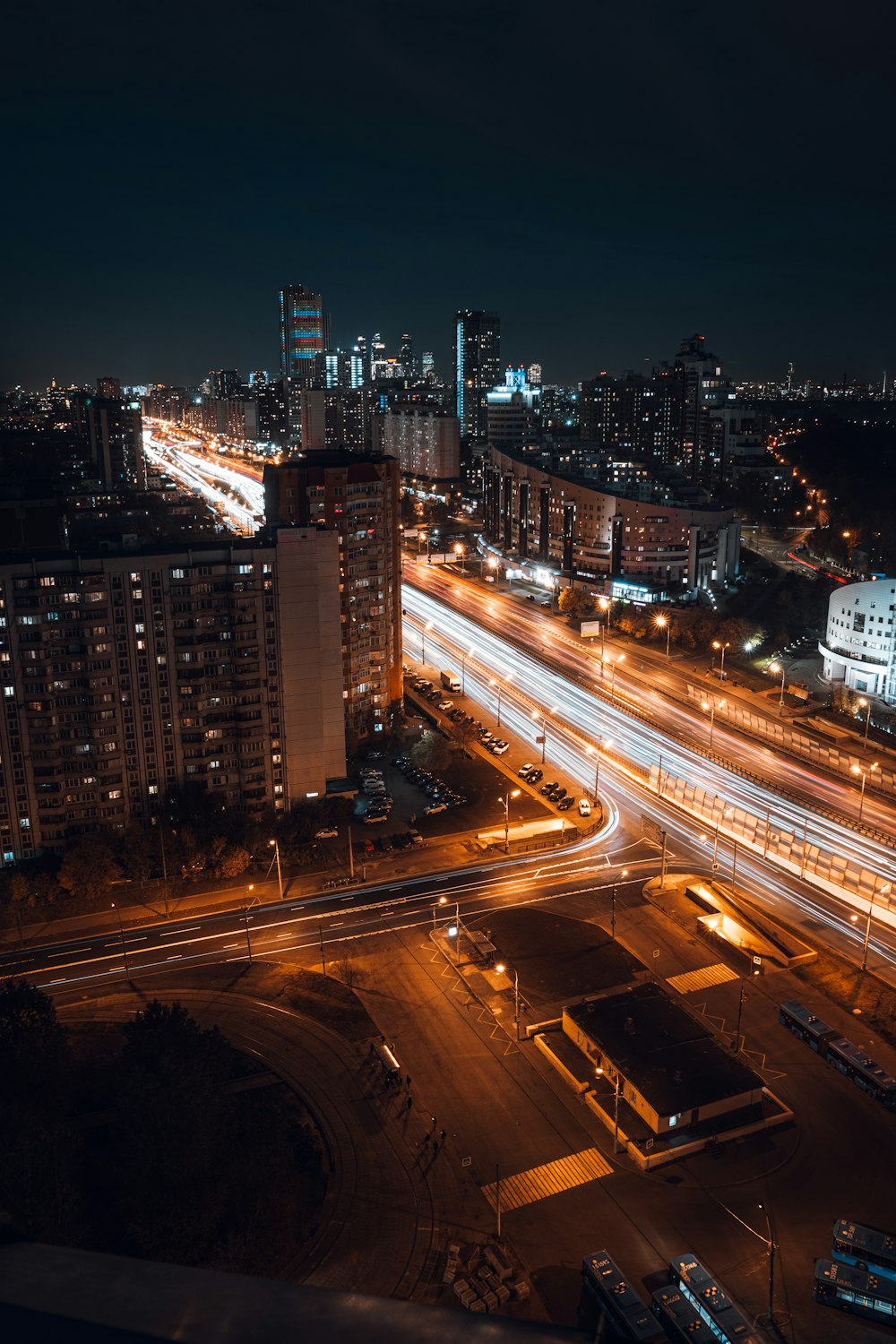 an aerial view of a city at night