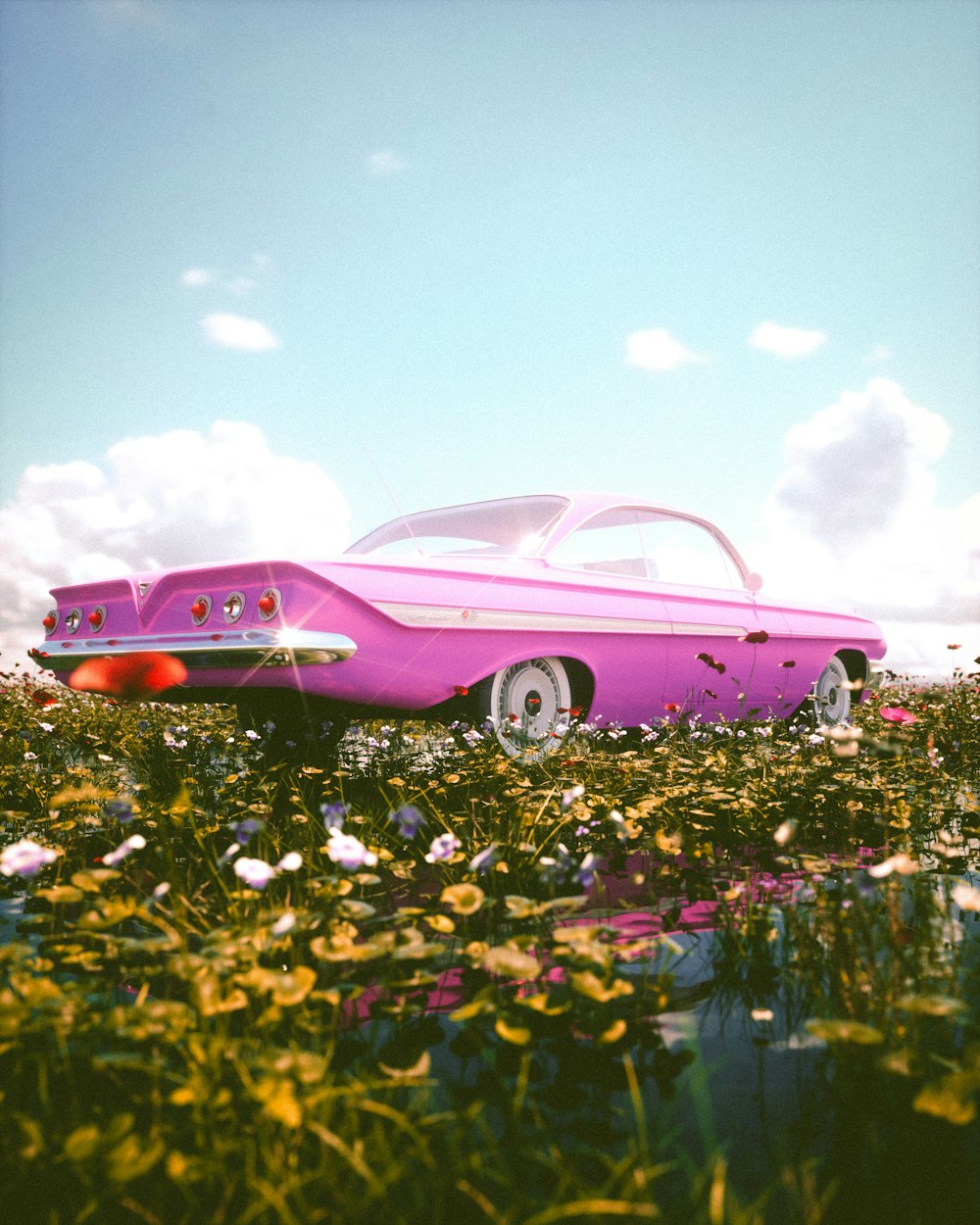 a pink car parked in a field of flowers