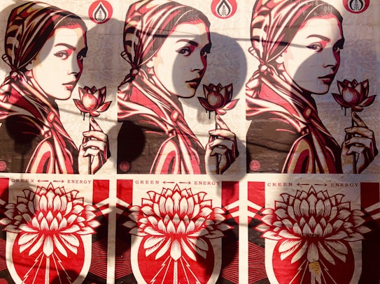 A stylized artwork featuring three portraits of a woman in similar poses, each holding a blooming lotus flower. The top half of the image showcases the portraits in different tones of red and beige with shadow effects. Below, there are three similar designs of a large lotus flower with the words 'Green Energy' repeated between each.