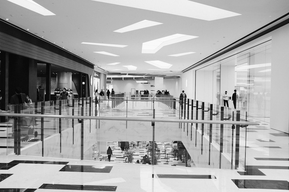 a black and white photo of a lobby