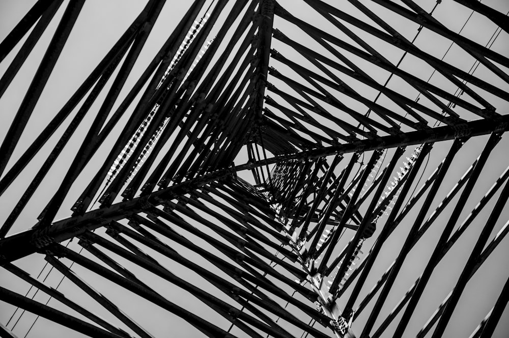 a black and white photo of a metal structure