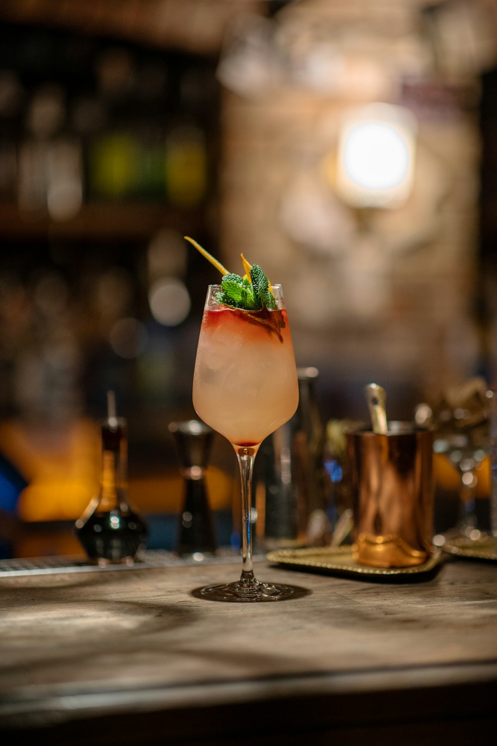 a drink sitting on top of a wooden table