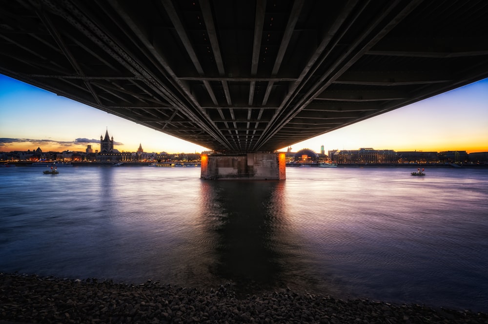 a view of a bridge over a body of water