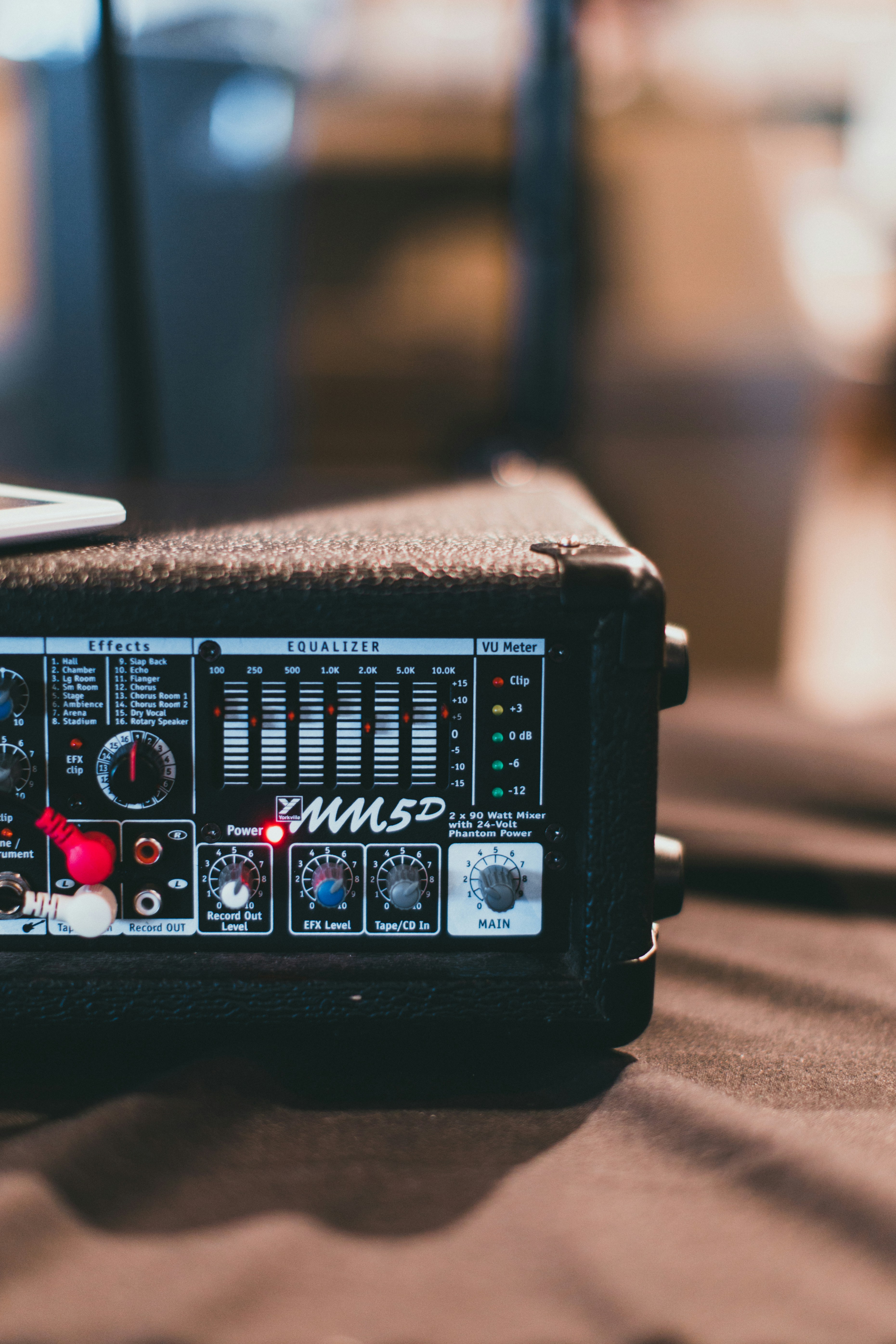 a close up of a sound board on a table