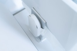 A repaired game console glowing softly on a minimalist desk with a high-tech vibe.