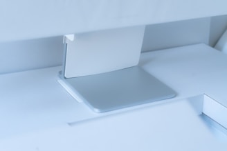 Modern 3D printed desk organizer in matte gray with clean lines on a bright surface