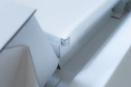 Close-up of sleek kitchen gadgets with modern design on a clean white background