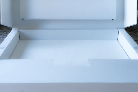 A clean, modern packaging box with soft shadows and rounded corners on a white background.