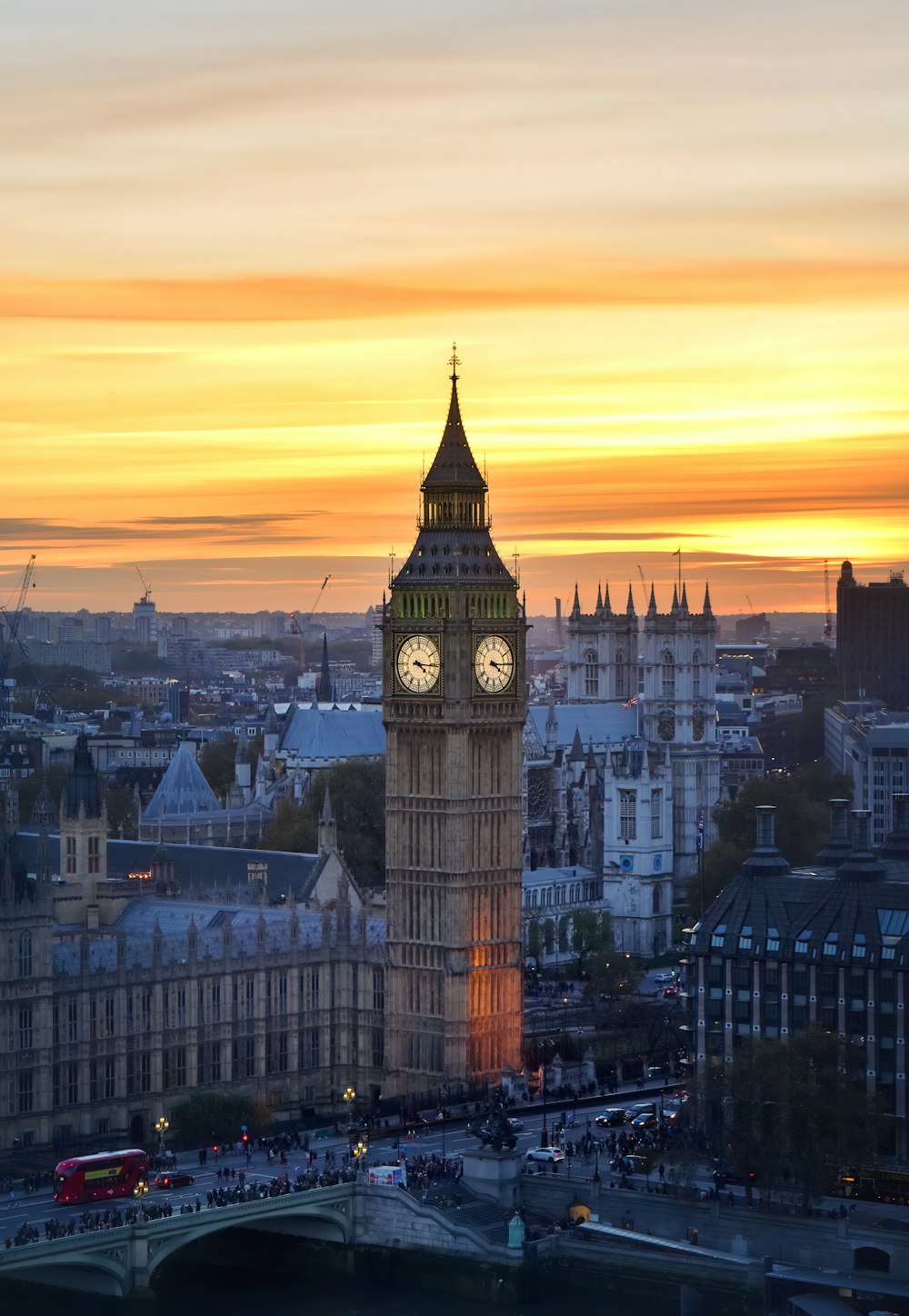 a large clock tower towering over a city