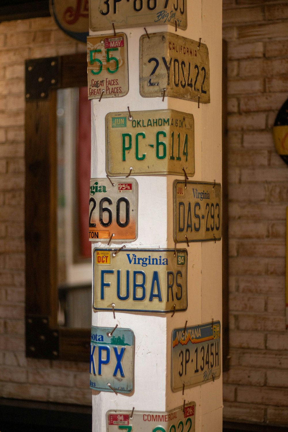 a bunch of license plates are stacked on top of each other