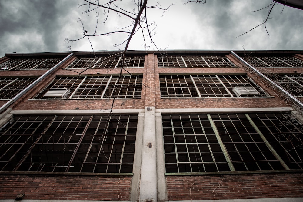 a tall brick building with lots of windows