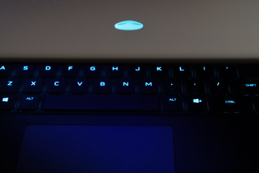 a close up of a laptop computer keyboard
