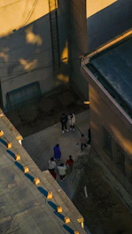 A community gathering in a renovated social housing courtyard in Chile.