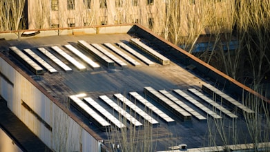 the roof of a building with a lot of windows