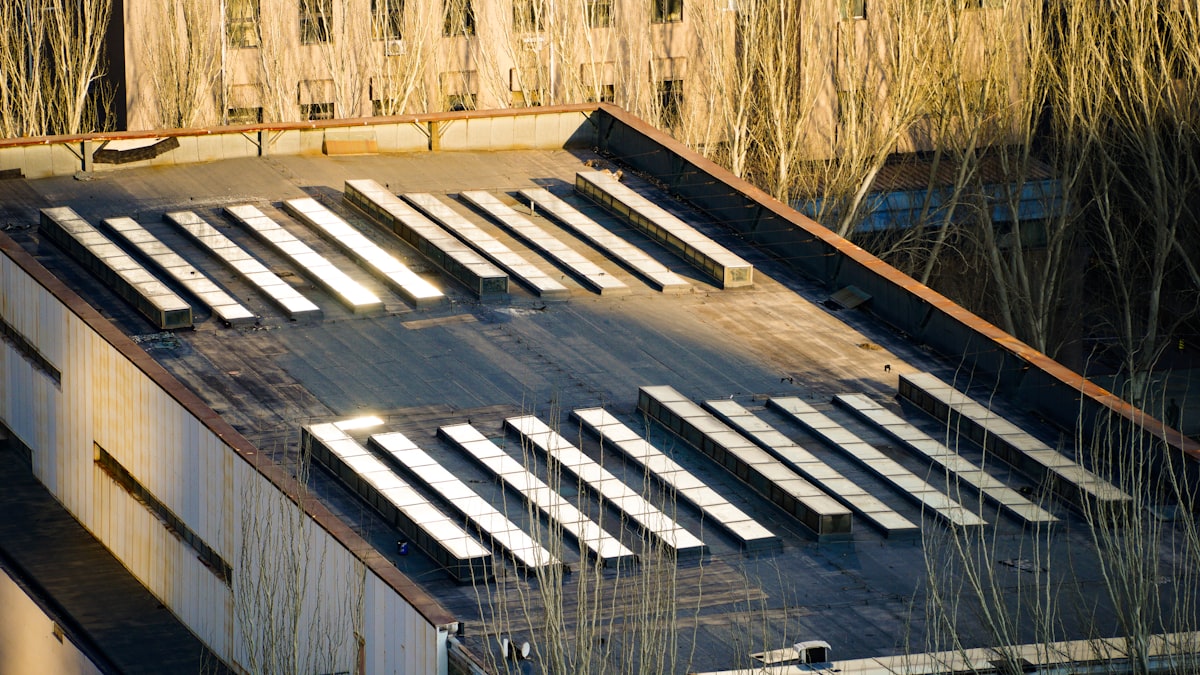 Industrial building rooftop with photovoltaic panels installed