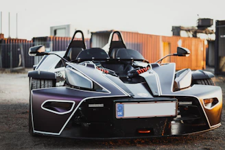 Side profile of the 2-door buggy highlighting its compact size and sporty wheels